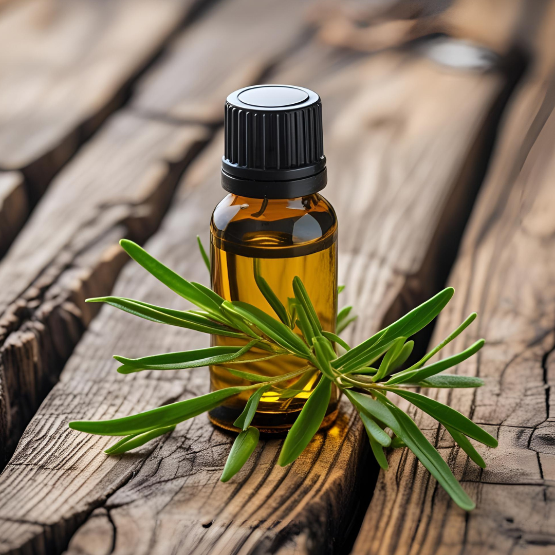 Amber bottle of tea tree oil with fresh green leaves on rustic wooden surface for tea tree for acne prone skin