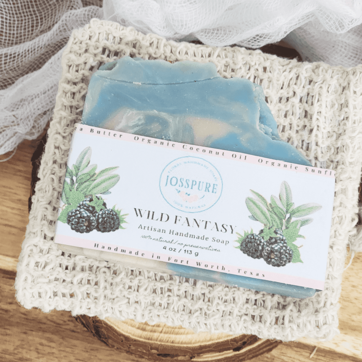 Blue handmade blackberry sage mild shea butter soap bar by JOSSPURE with natural ingredients label