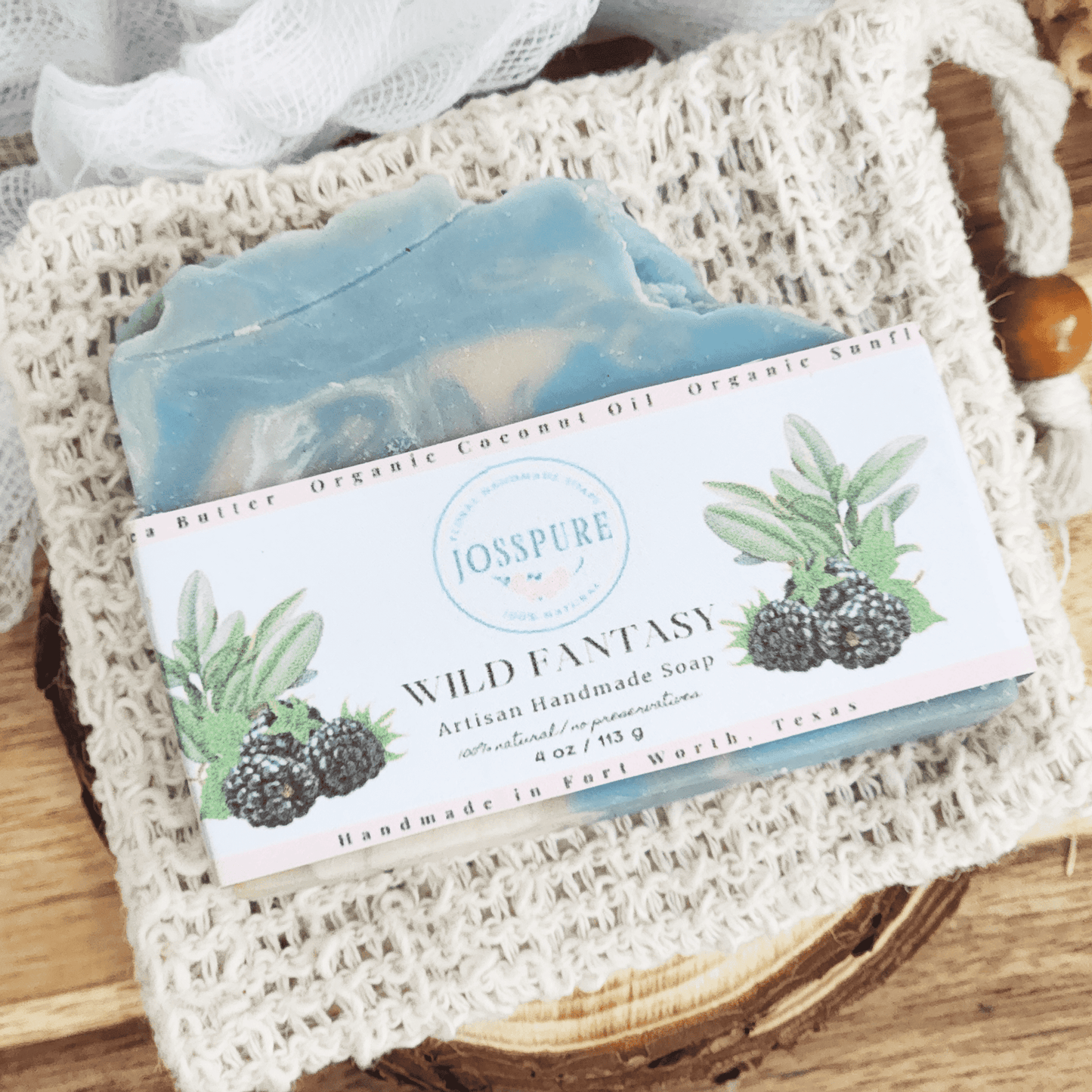 JOSSPURE blackberry sage mild shea butter soap Wild Fantasy artisan handmade soap bar on a textured natural cloth