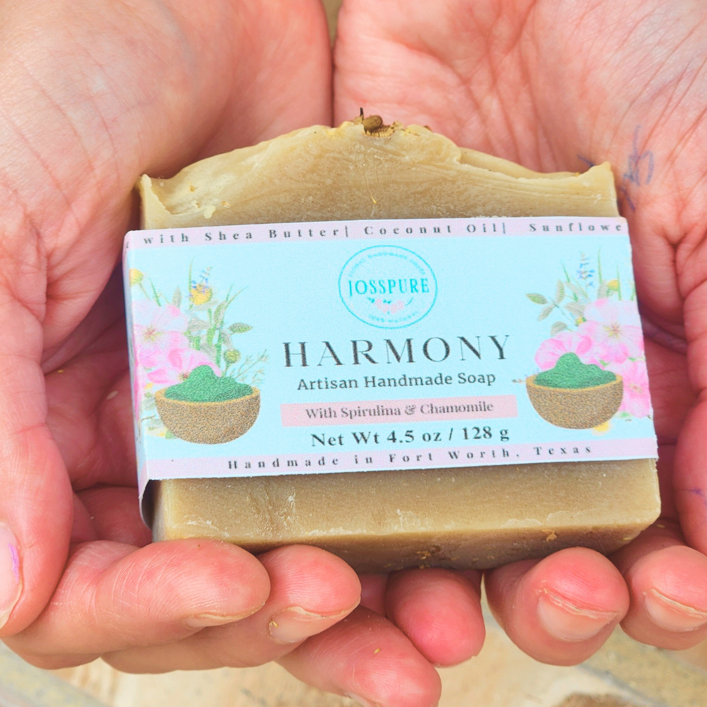 Green All Natural Soap Harmony artisan handmade soap bar with spirulina and chamomile in hands