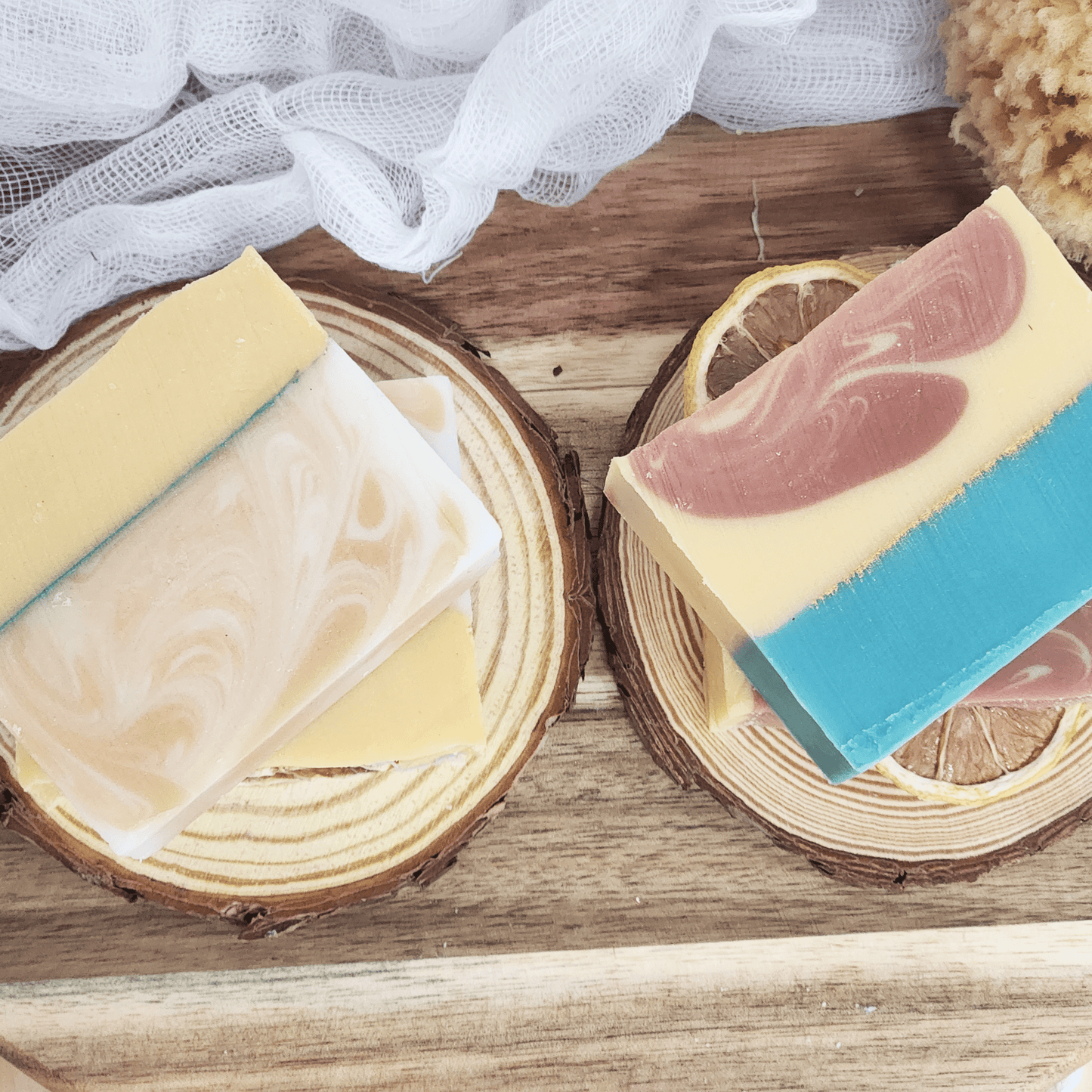 JOSSPURE lemongrass mild shea butter soap bars with natural swirls on wooden slices