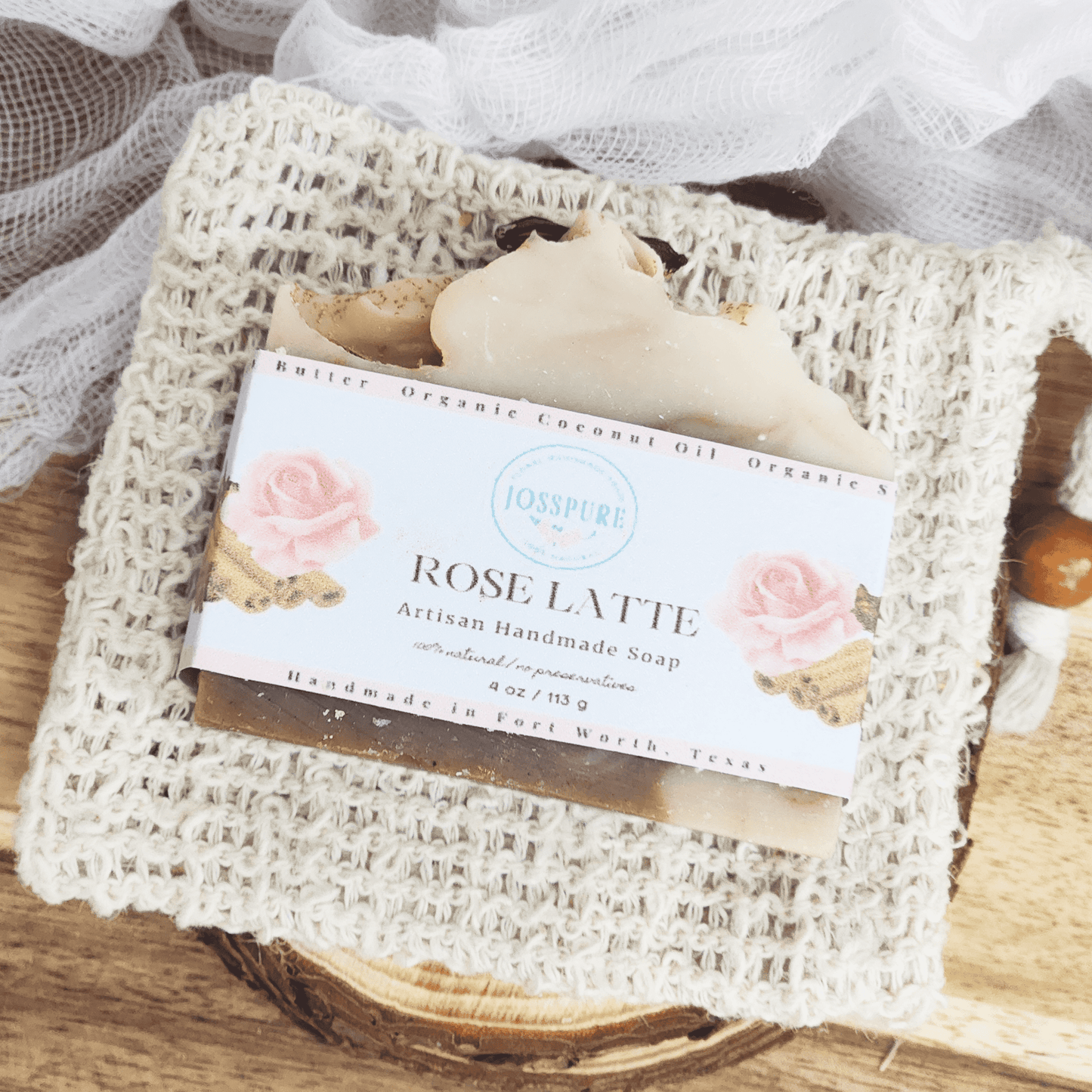 JOSSPURE chai latte mild shea butter soap bar on a textured soap saver cloth with natural artisan packaging