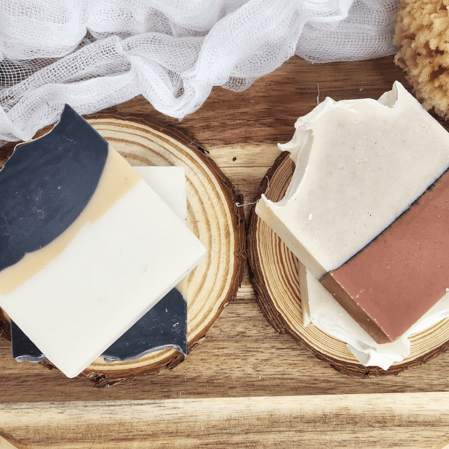 JOSSPURE charcoal unisex soap bars with natural handmade soap and body care on wooden display