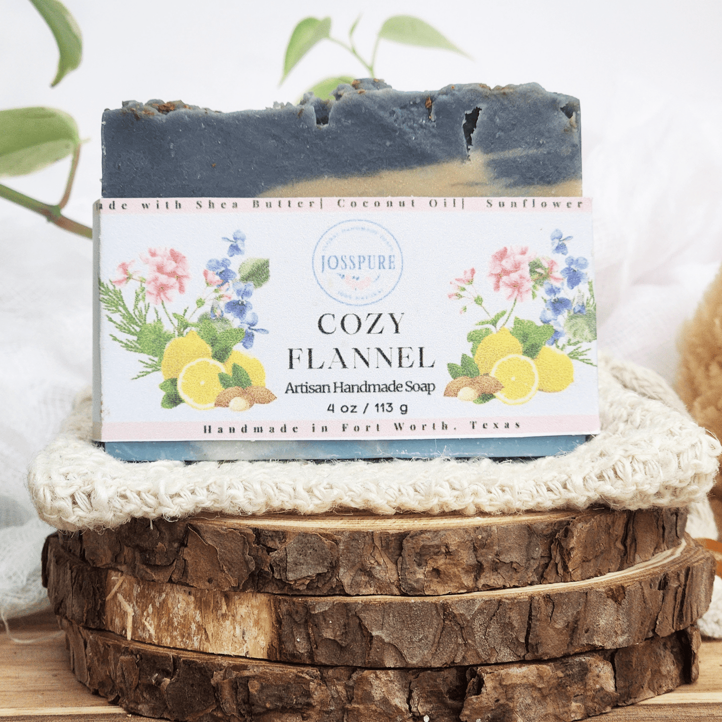JOSSPURE Cozy flannel mild shea butter soap handmade with natural ingredients displayed on wooden slices