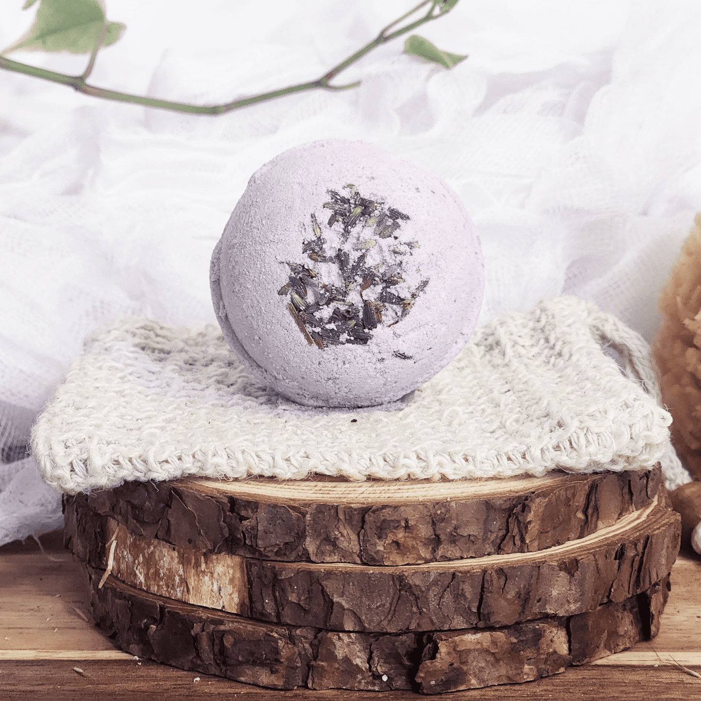 JOSSPURE handmade lavender bath bomb with dried lavender petals on knitted cloth and wooden slices