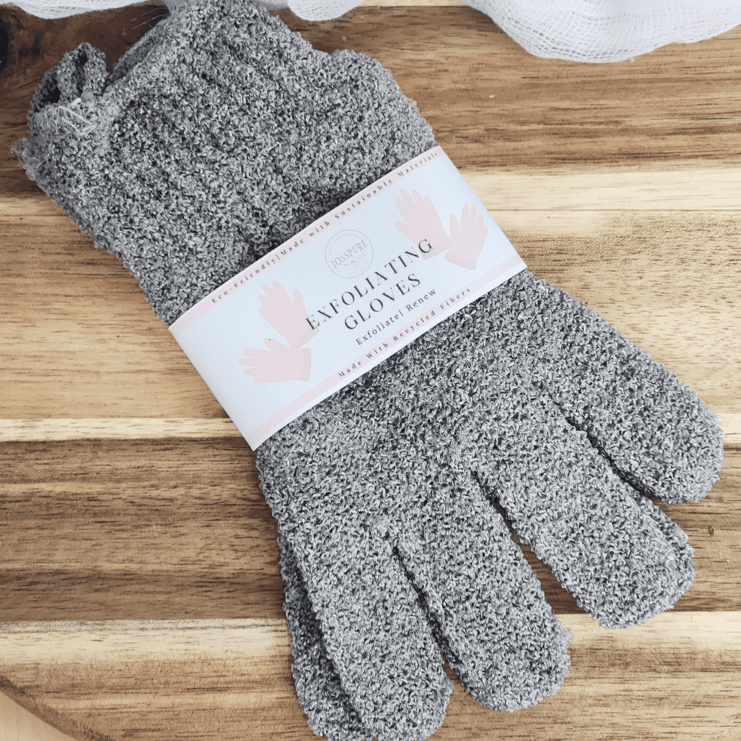 JOSSPURE natural exfoliating gloves in gray textured fabric for gentle skin exfoliation