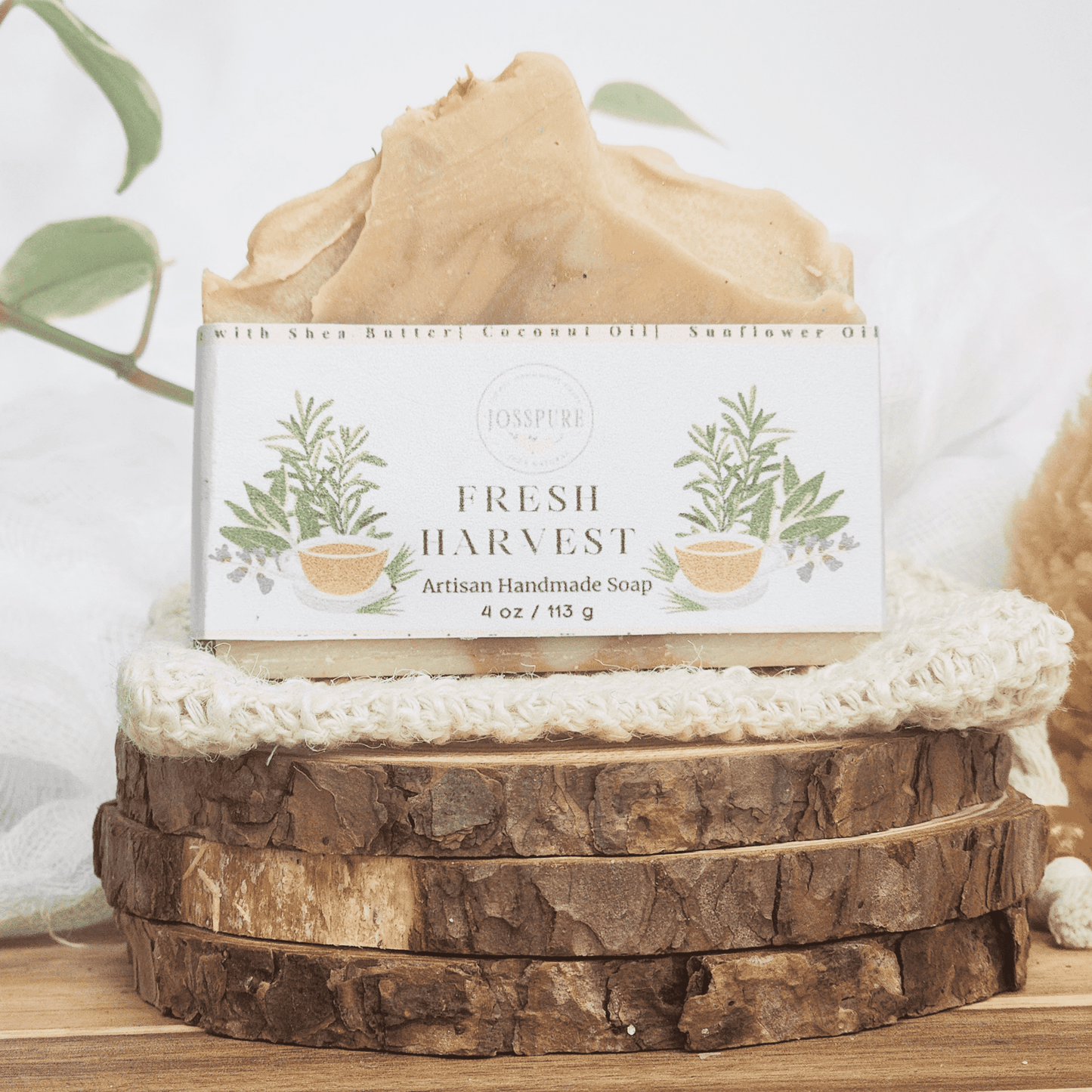 JOSSPURE rosemary lemongrass mild shea butter soap handmade with natural ingredients on wood slices
