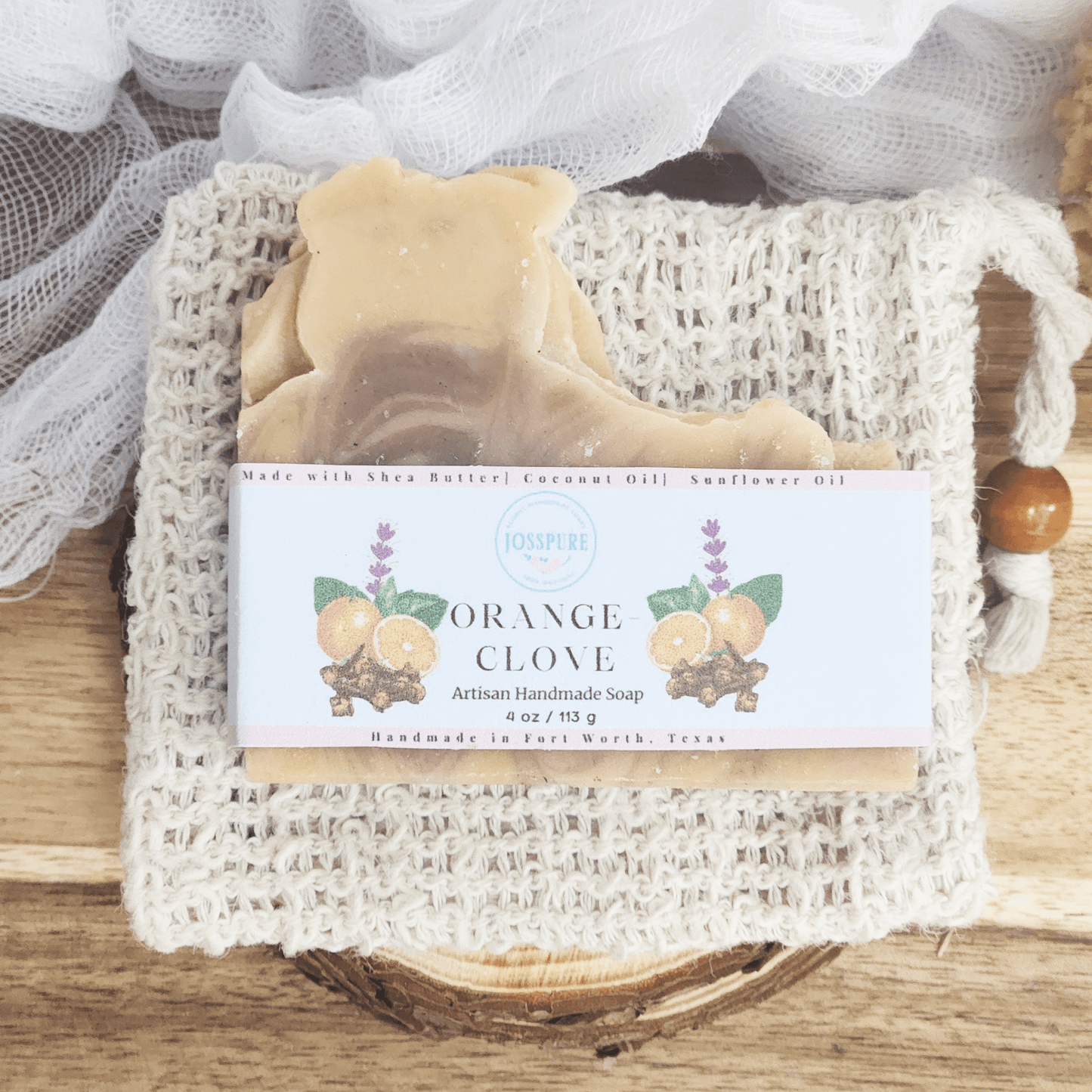 Orange clove patchouli mild shea butter soap bar handmade by JOSSPURE on a natural woven cloth pouch