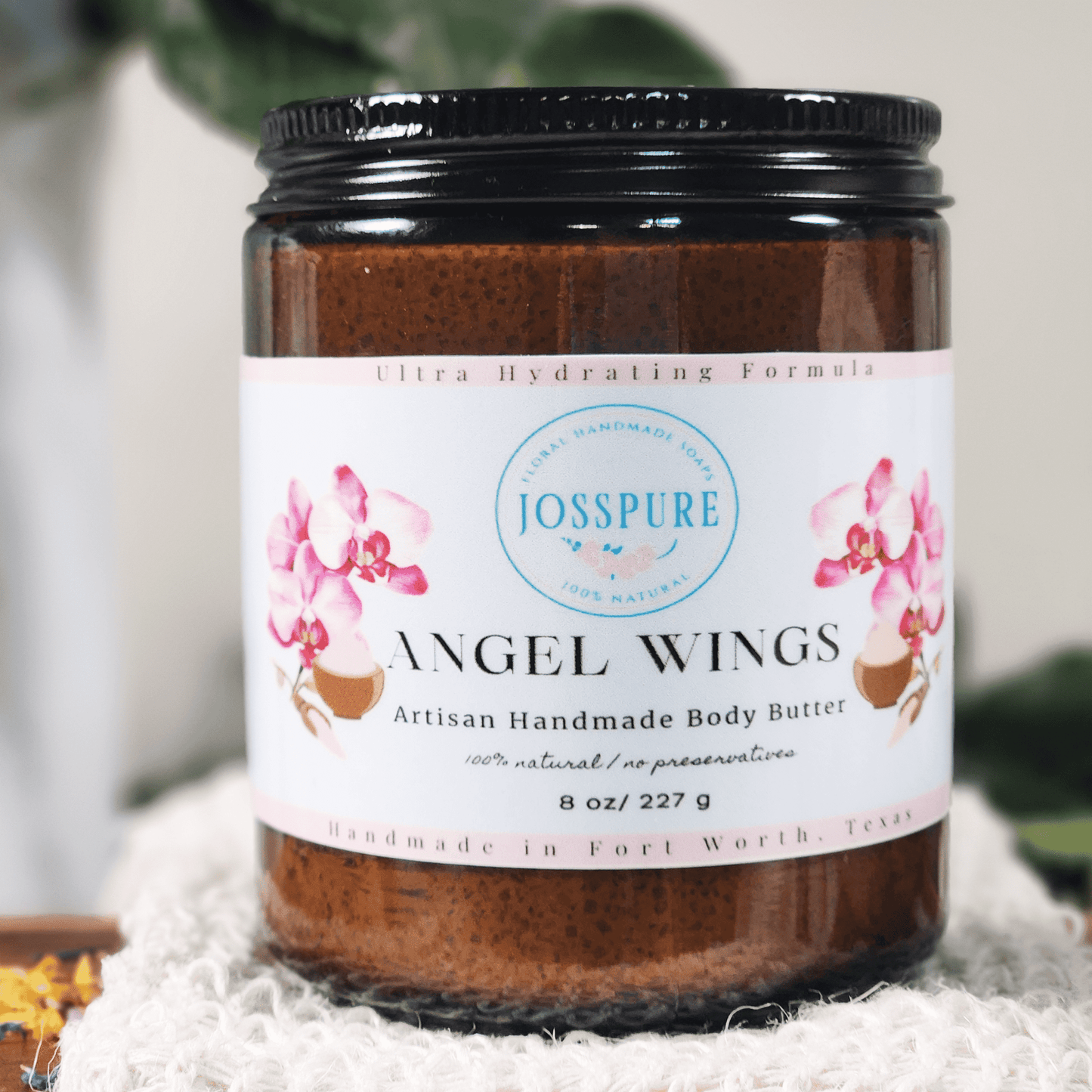 JOSSPURE orchid sea salt mango butter whipped body butter in amber jar with black lid