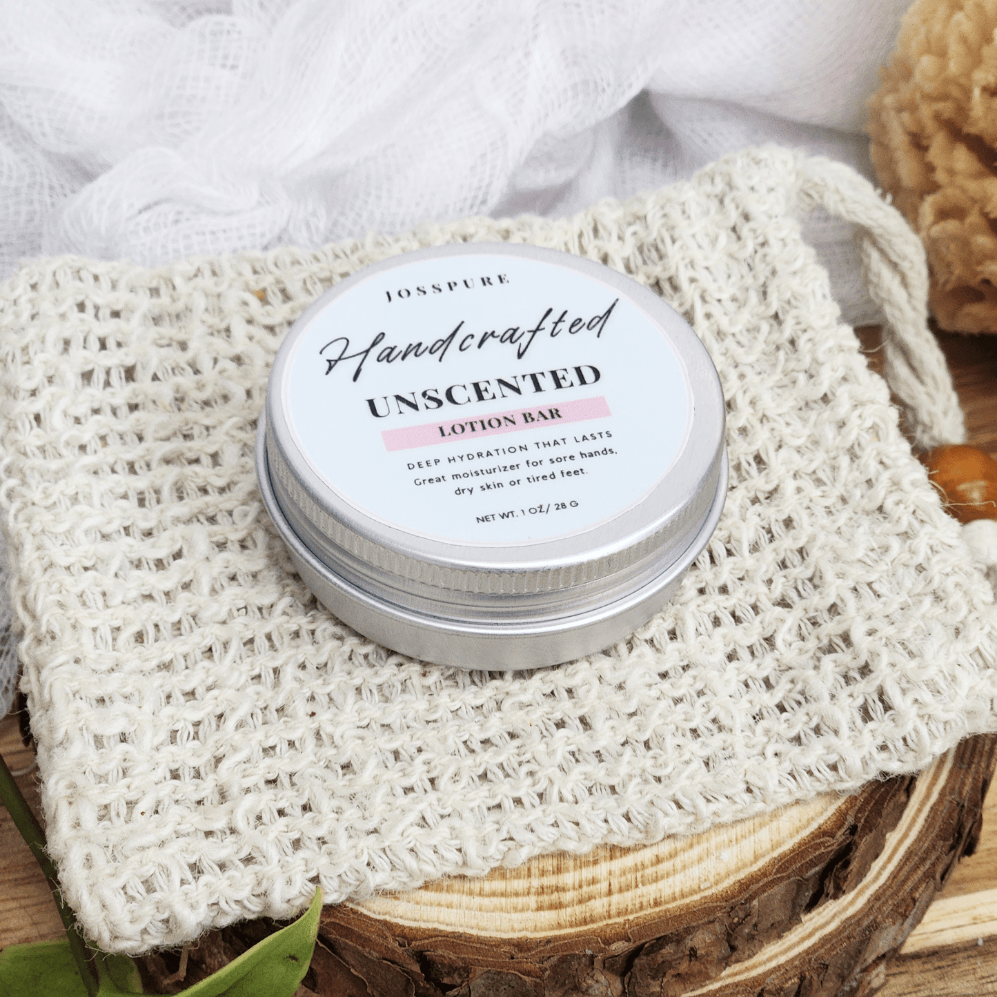 JOSSPURE Unscented Travel Size Mini Lotion Bar in metal tin on natural woven cloth