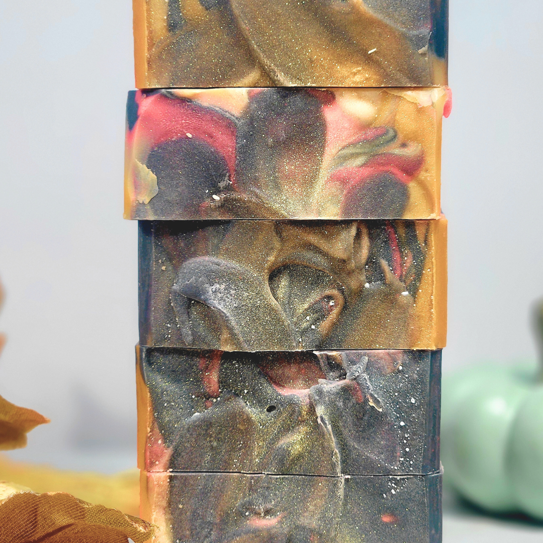 Artisan soaps in vibrant colors featured in the Fall Essentials Guide for women with dry skin
