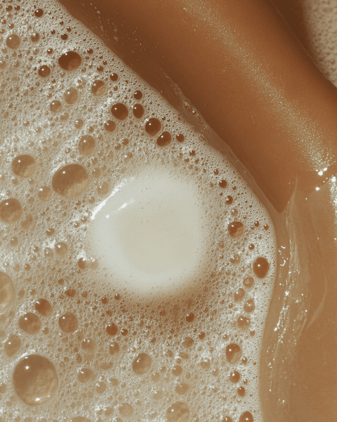 Close up of natural soap lather on skin highlighting natural soap benefits for moisturizing