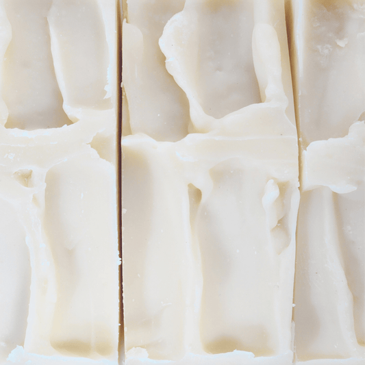 Close-up of natural tallow soap bars showcasing a creamy, textured surface and clean cut lines