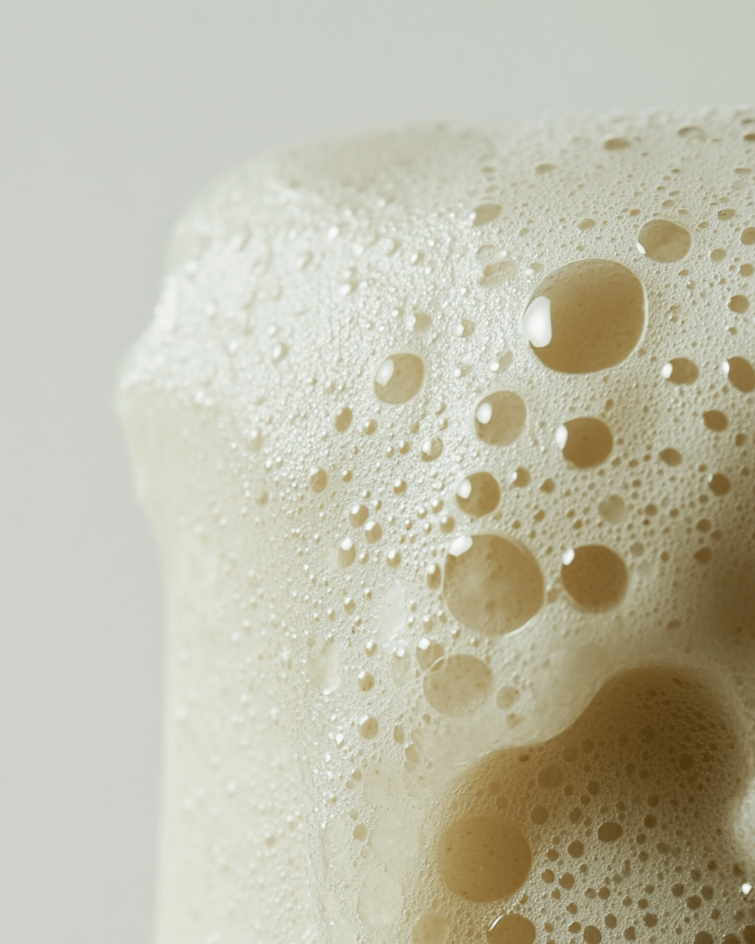 Close-up of foamy Artisan Fruity Shea Butter Soaps highlighting rich lather and creamy texture