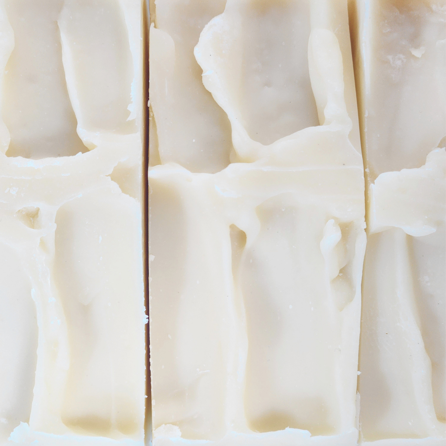 Close-up of a woman with glowing skin representing the benefits of shea butter soap bars for sensitive skin