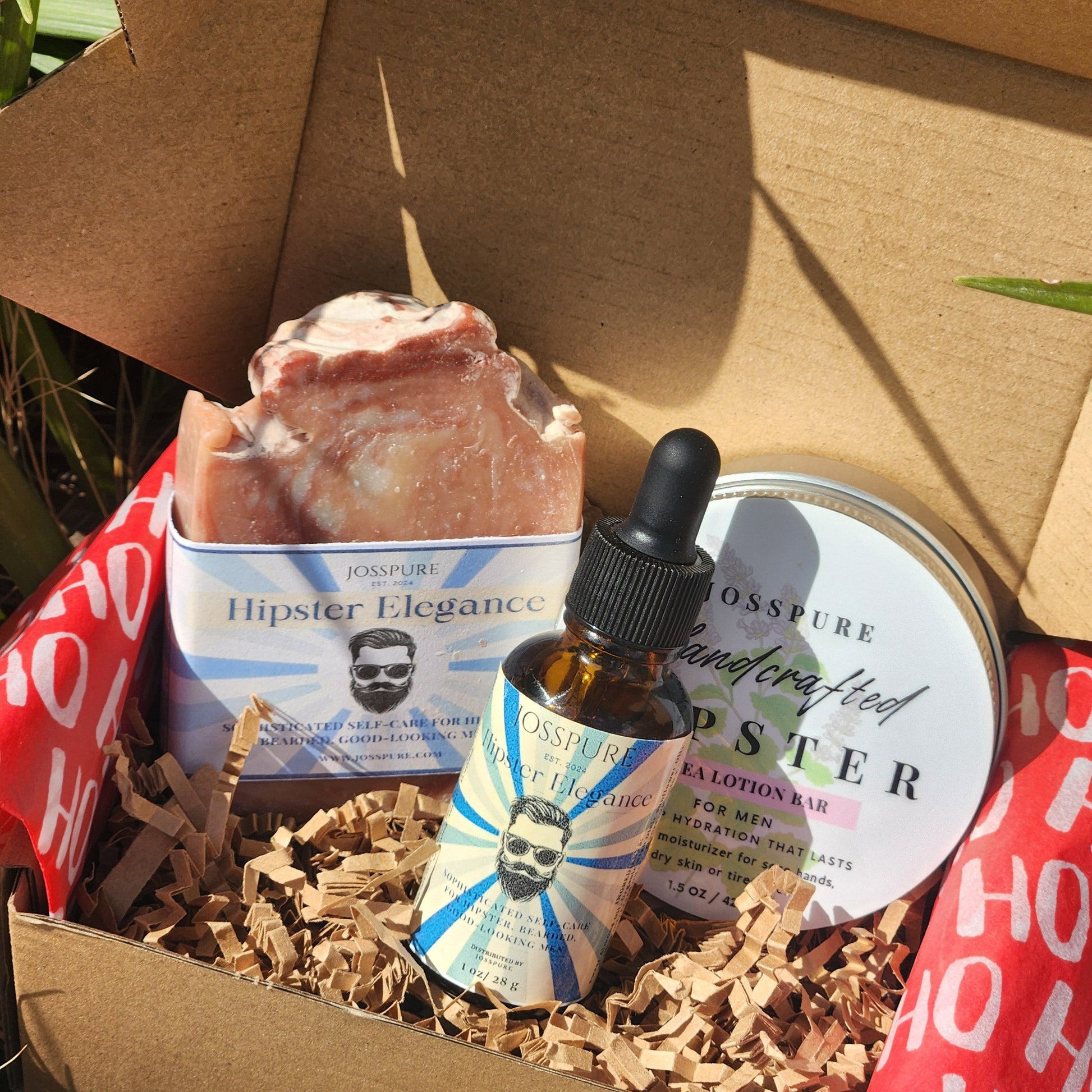 Product packaging with a bottle, box, and other items on a natural background