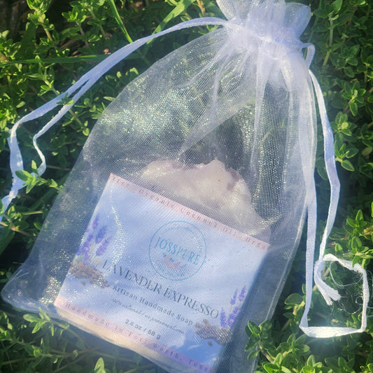 Artisan handmade wedding soap favors lavender expresso soap in sheer white drawstring bag on green grass