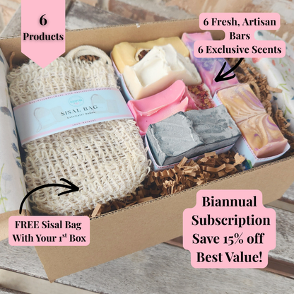 Six artisan soap bars in a subscription box with a free sisal bag for natural body care enthusiasts