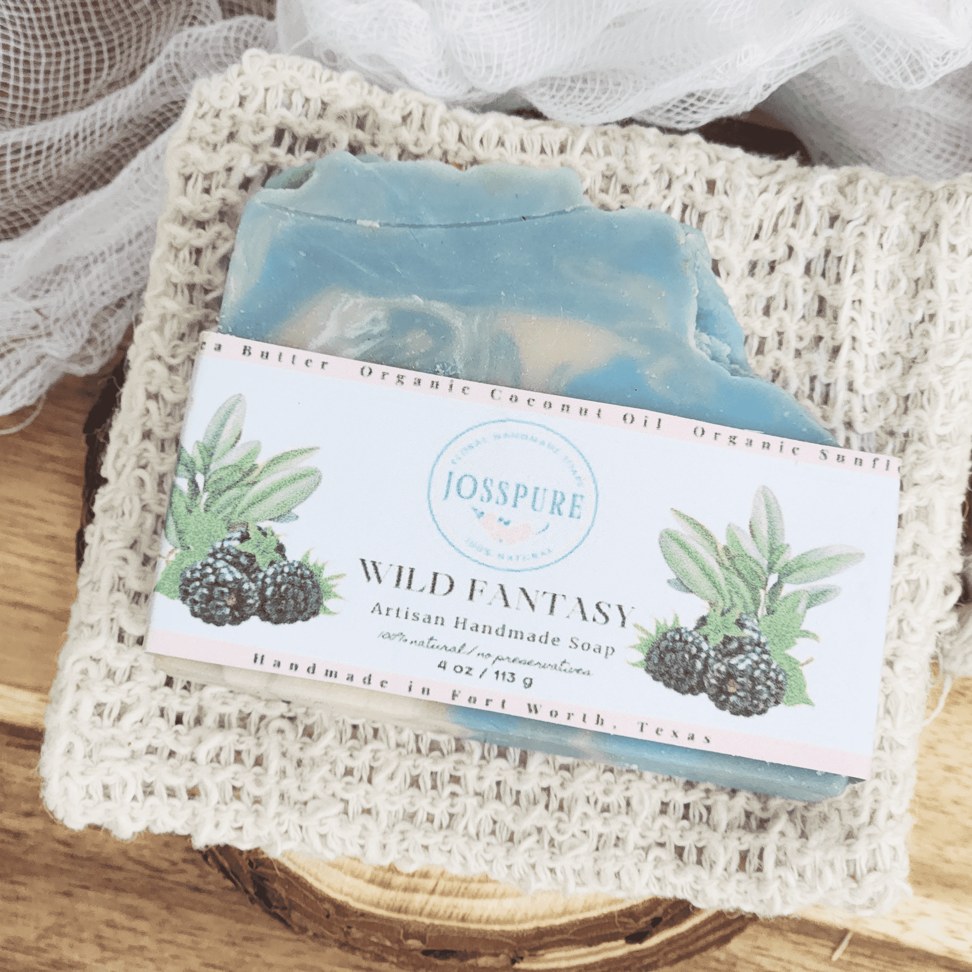 Blue handmade blackberry sage mild shea butter soap bar by JOSSPURE with natural ingredients label