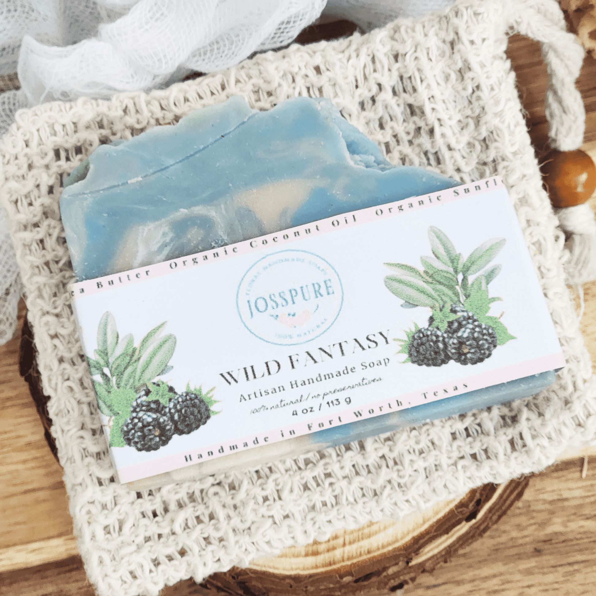JOSSPURE blackberry sage mild shea butter soap Wild Fantasy artisan handmade soap bar on a textured natural cloth