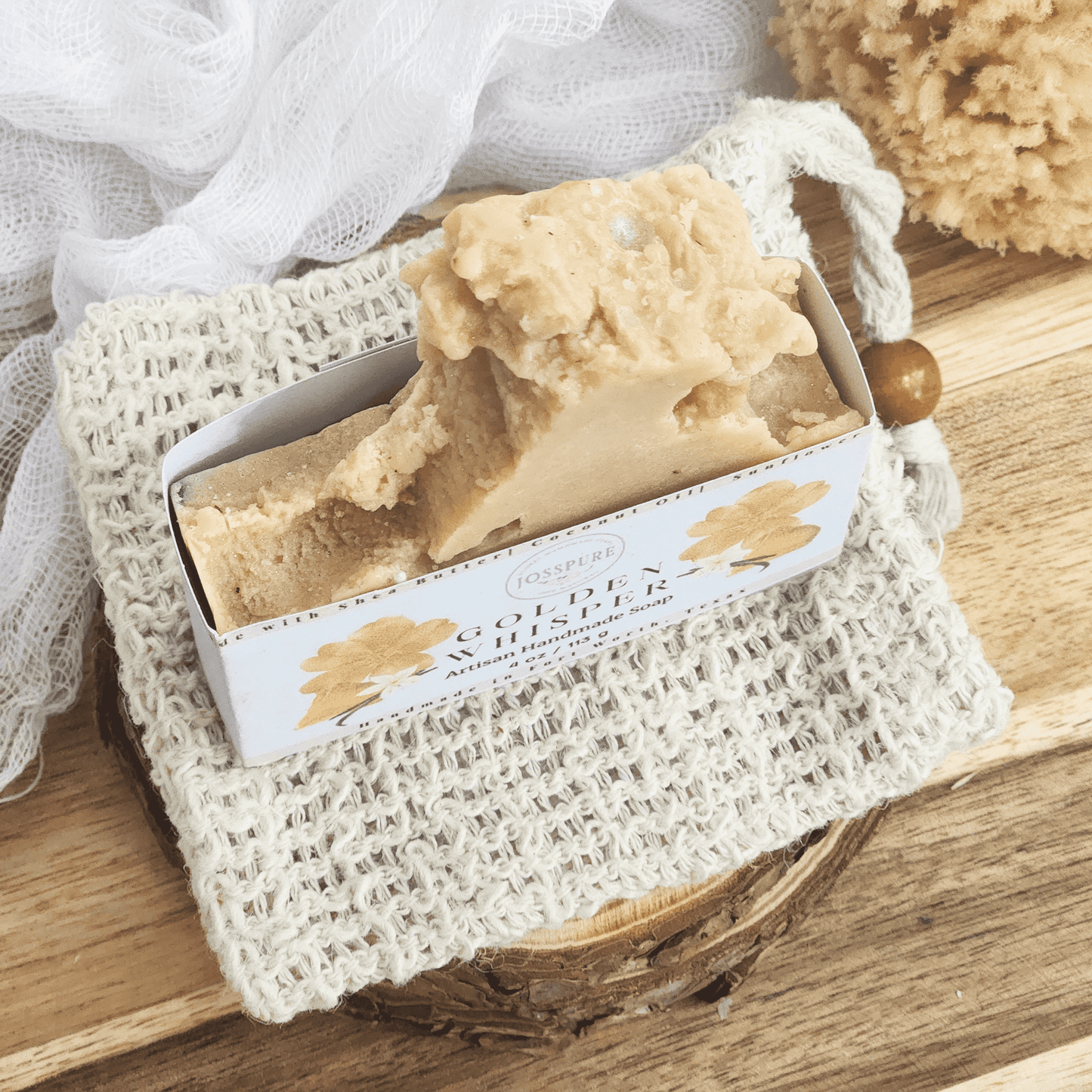 JOSSPURE handmade coco chanel perfume soap with natural ingredients on woven cloth