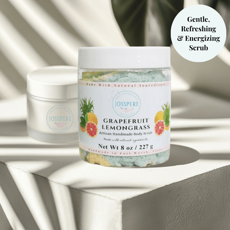 JOSSPURE grapefruit lemongrass luxury sugar scrub in clear jar with white lid on textured surface