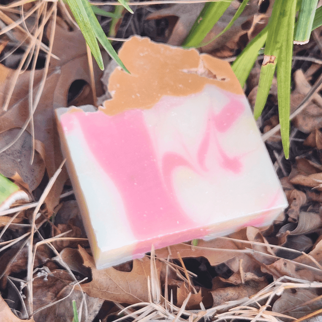 Champagne dreams shea butter soap with pink and cream swirls, perfect for luxurious bathing experiences