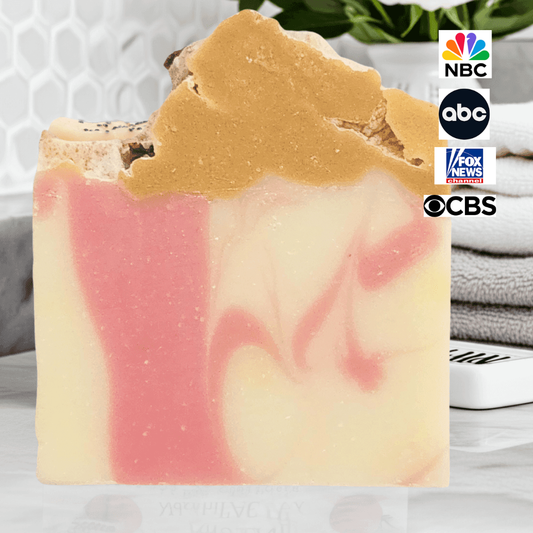 Champagne dreams shea butter soap with swirls of pink and gold, perfect for natural body care enthusiasts
