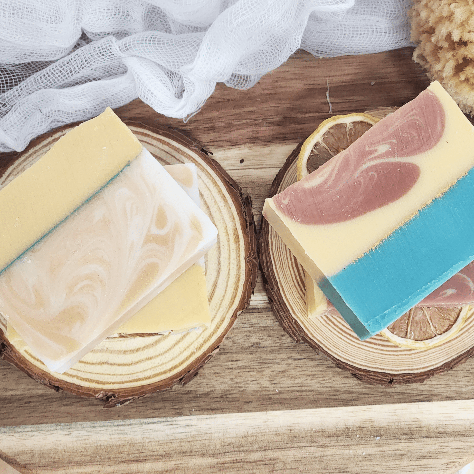 JOSSPURE lemongrass mild shea butter soap bars with natural swirls on wooden slices