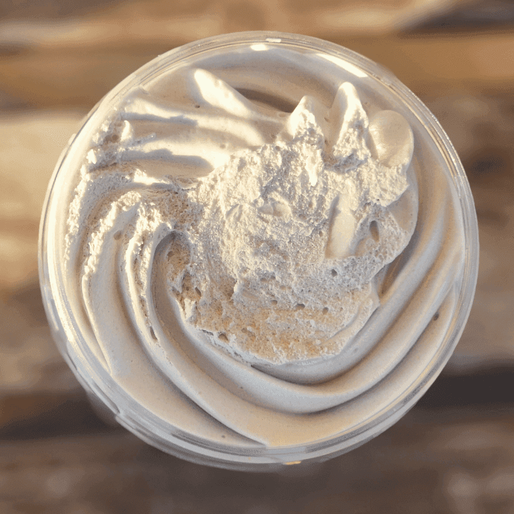 Top view of JOSSPURE marshmallow vanilla shea whipped body butter in a clear jar