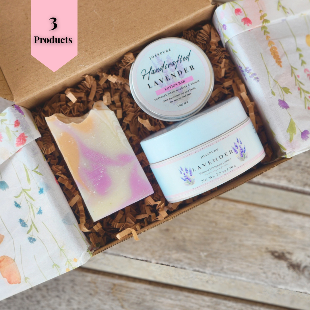 Travel size self-care bundle featuring handmade soaps and lavender body care in a gift box
