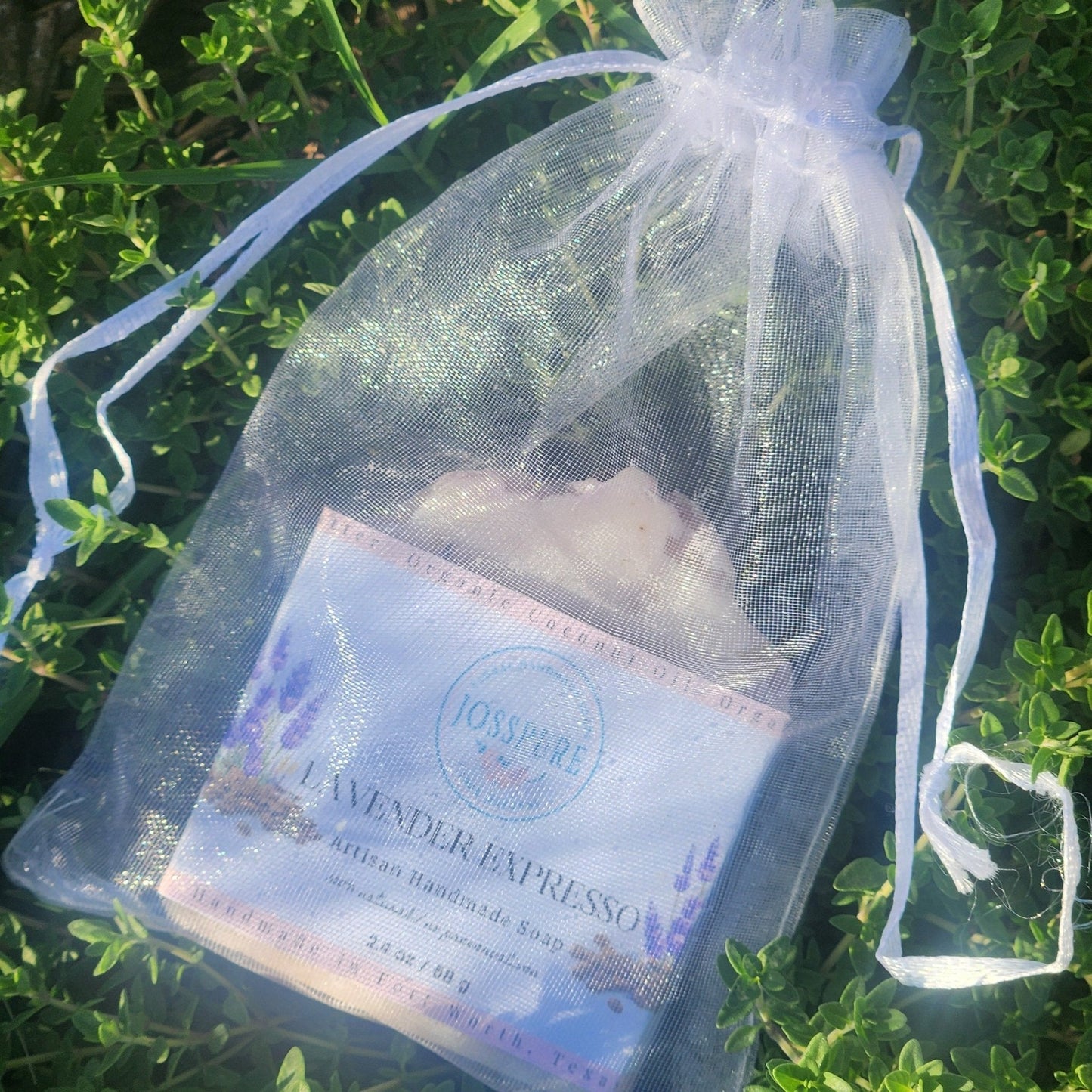 Artisan handmade wedding soap favors lavender expresso soap in sheer white drawstring bag on green grass