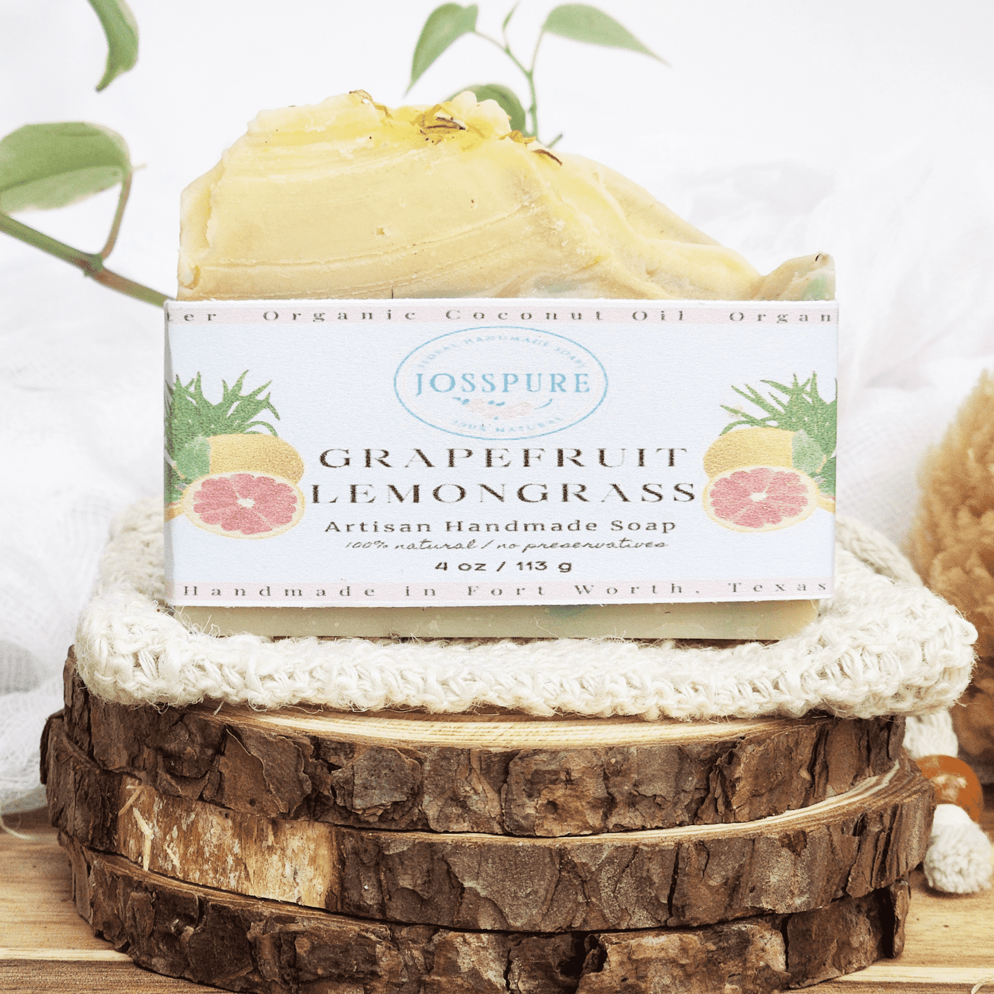 JOSSPURE grapefruit lemongrass mild shea butter soap handmade artisan bar on wooden slabs