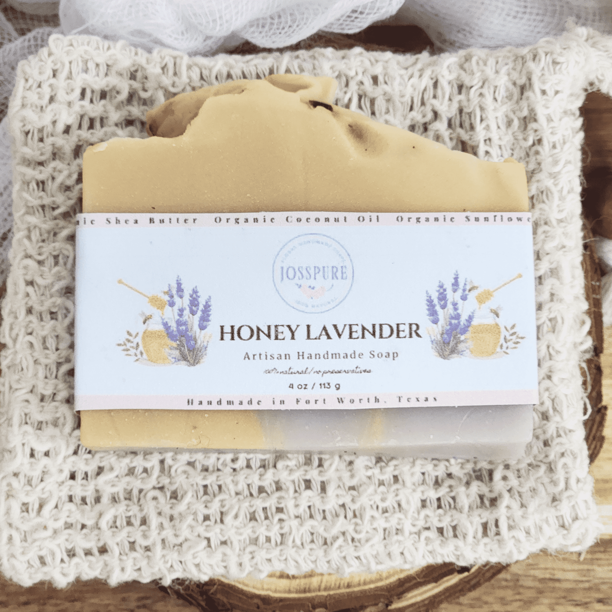 JOSSPURE honey lavender mild shea butter soap on a textured backdrop, showcasing its natural ingredients