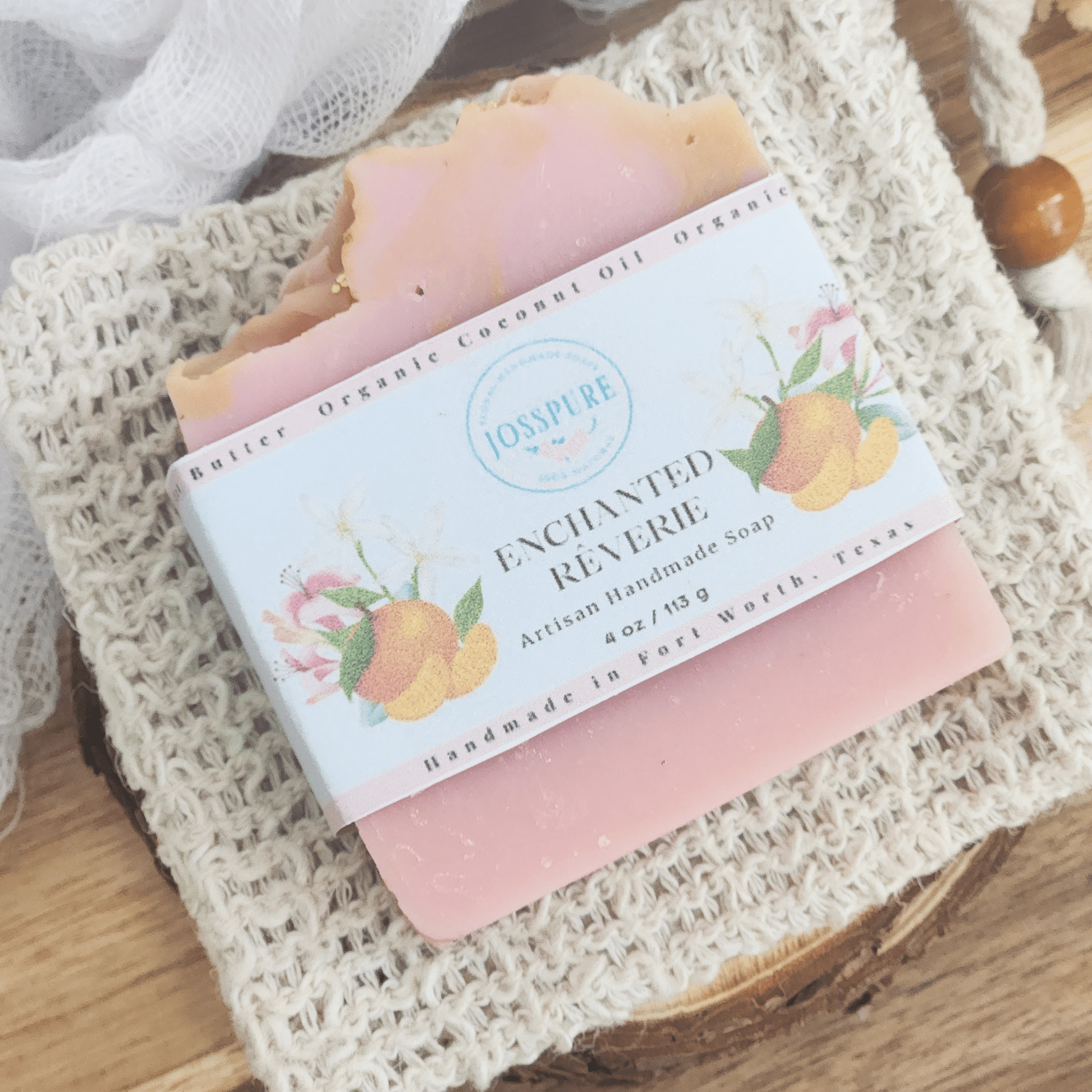 JOSSPURE jasmine gardenia mild shea butter soap bar with pink and beige tones on a knitted cloth