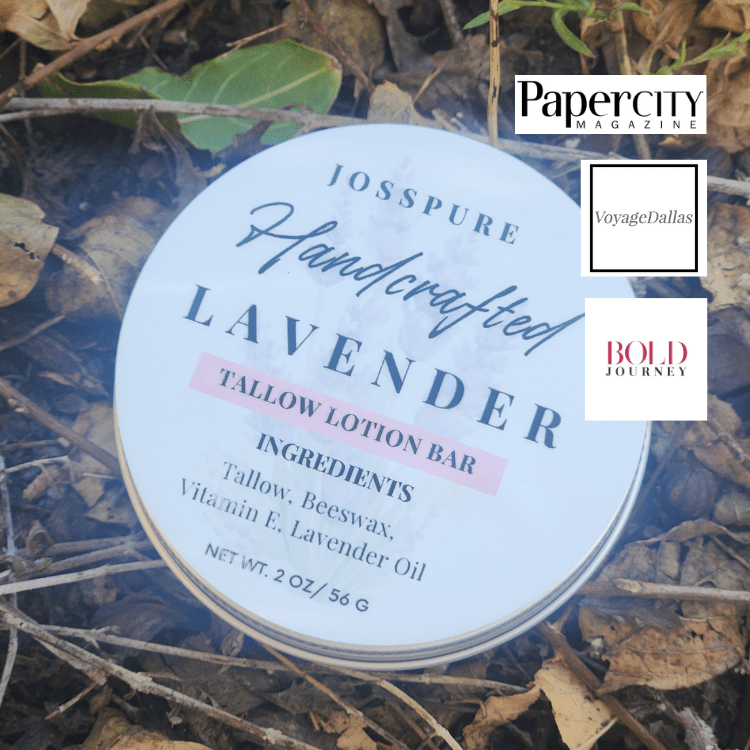JOSSPURE lavender tallow solid lotion bar in a round tin on natural leaves for moisturizing skin care