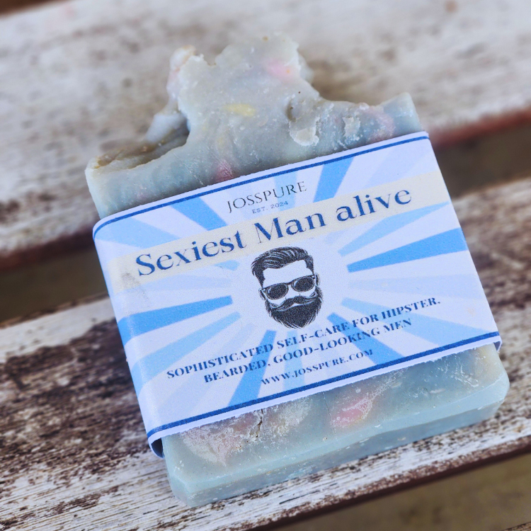 JOSSPURE handmade soap with bergamot and shea butter, featuring a stylish wrapper for men's grooming