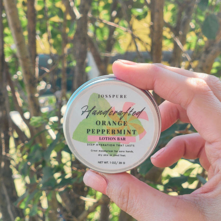 JOSSPURE Handcrafted Peppermint Orange Travel size mini lotion bar in a metal tin for moisturizing skin.
