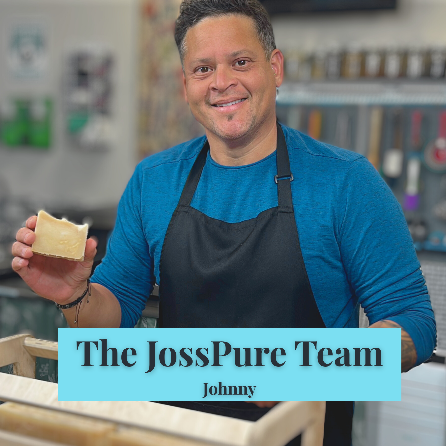 JOSSPURE team member holding a handmade soap bar next to wooden soap molds for Three Mini Travel Size Lotion Bars