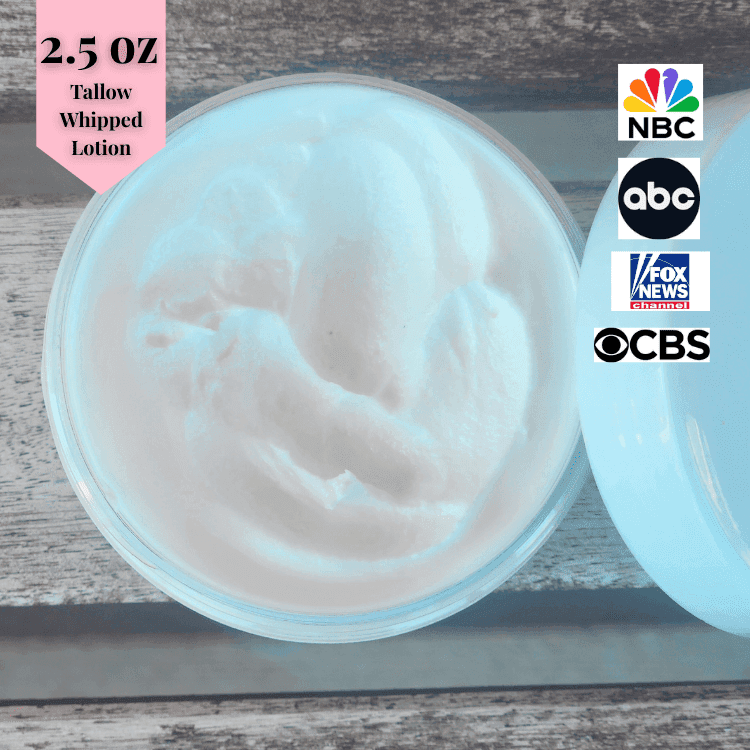 2.5 oz JOSSPURE whipped tallow lotion in a clear jar with creamy texture for natural skin care