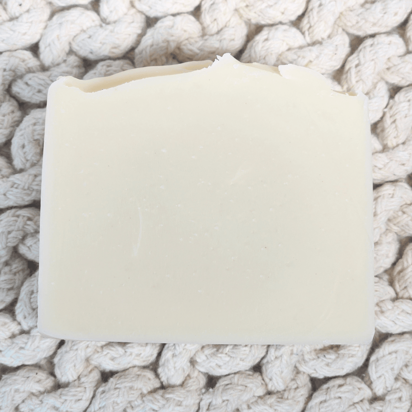 JOSSPURE lavender honey tallow soap on a textured natural background for skincare enthusiasts