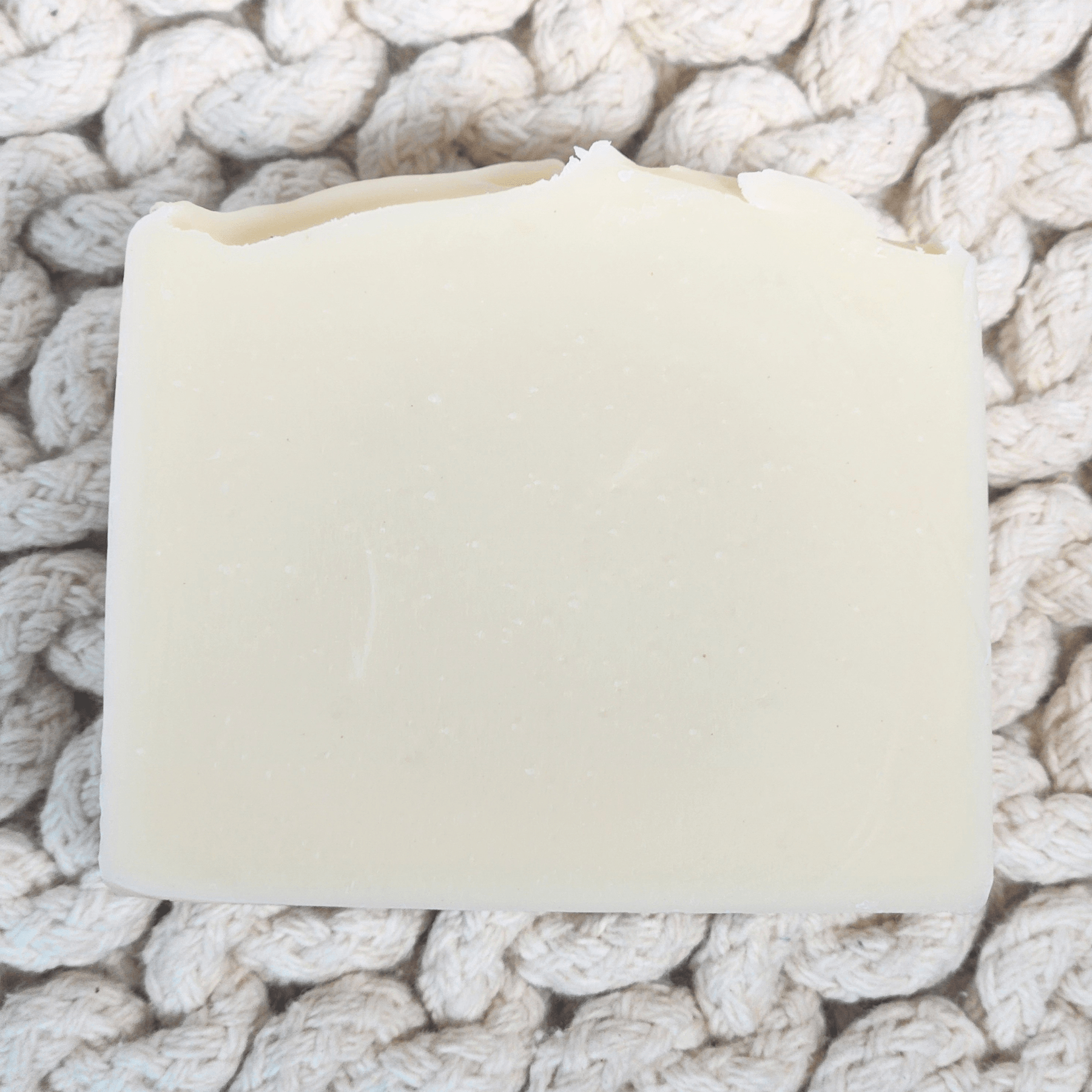 JOSSPURE lavender honey tallow soap on a textured natural background for skincare enthusiasts