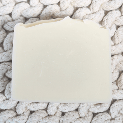JOSSPURE lavender honey tallow soap on a textured natural background for skincare enthusiasts