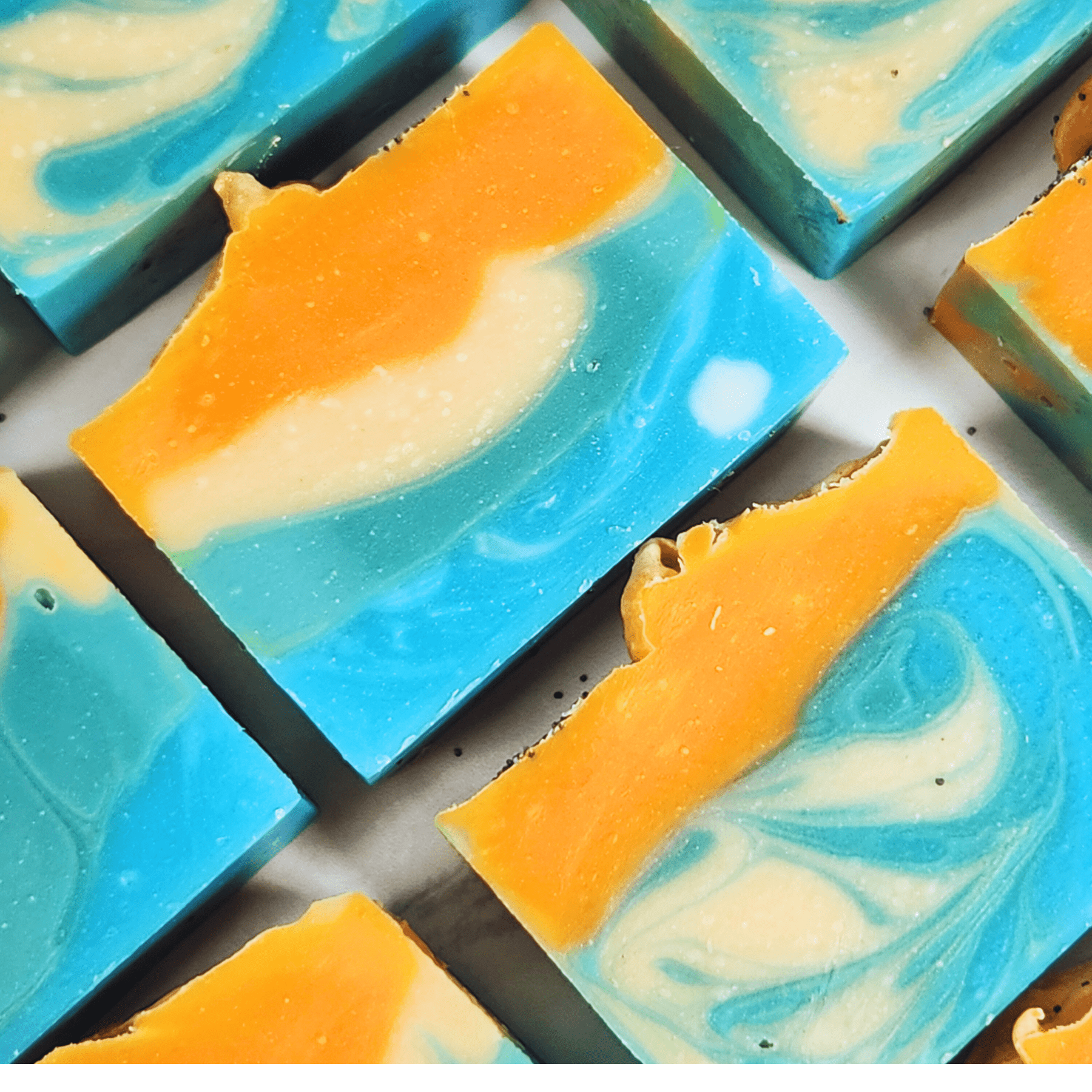 JOSSPURE mango papaya shea butter soap with vibrant orange blue and cream swirls handmade natural body care