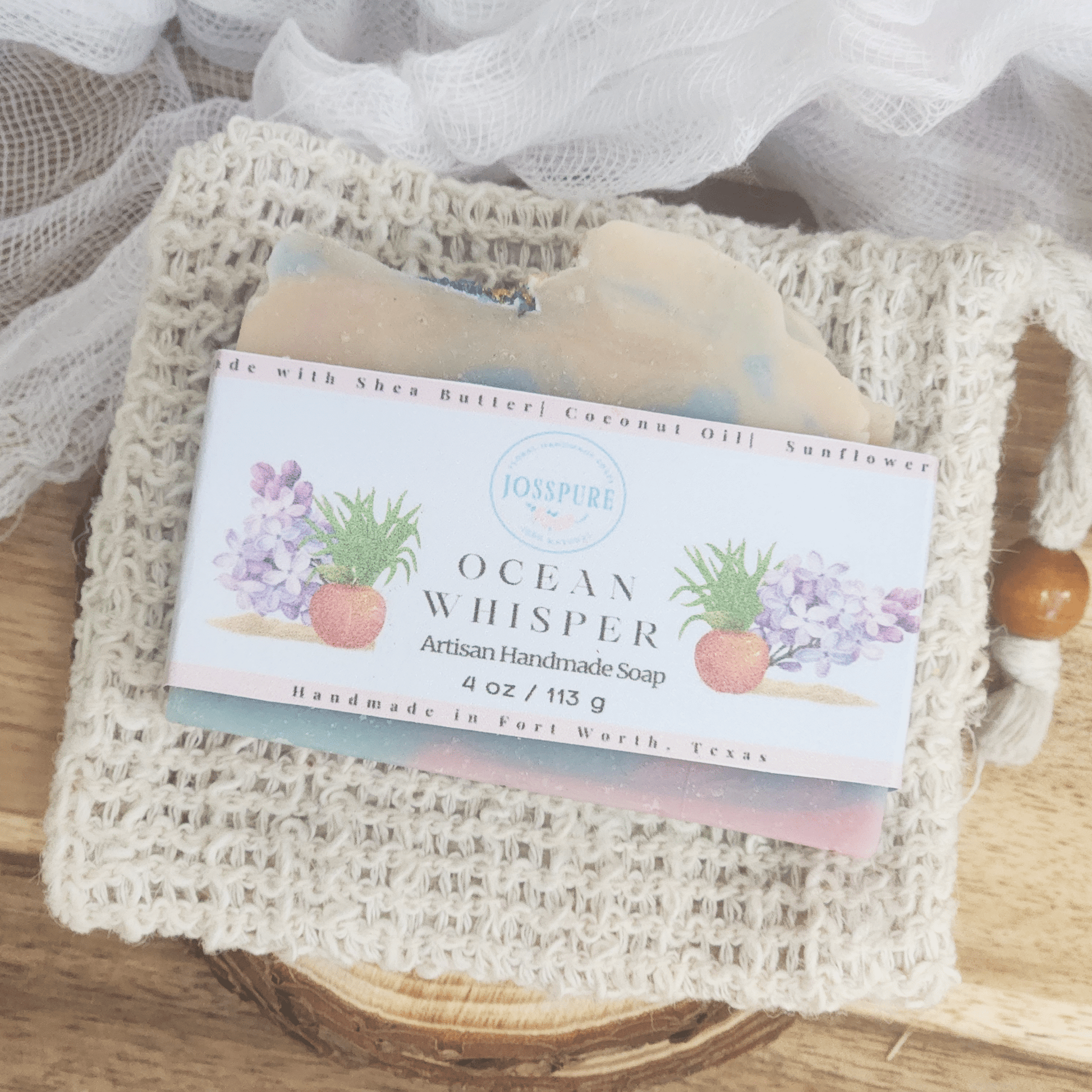Ocean luxury mild shea butter soap bar by JOSSPURE handmade with natural ingredients on a textured soap saver pouch