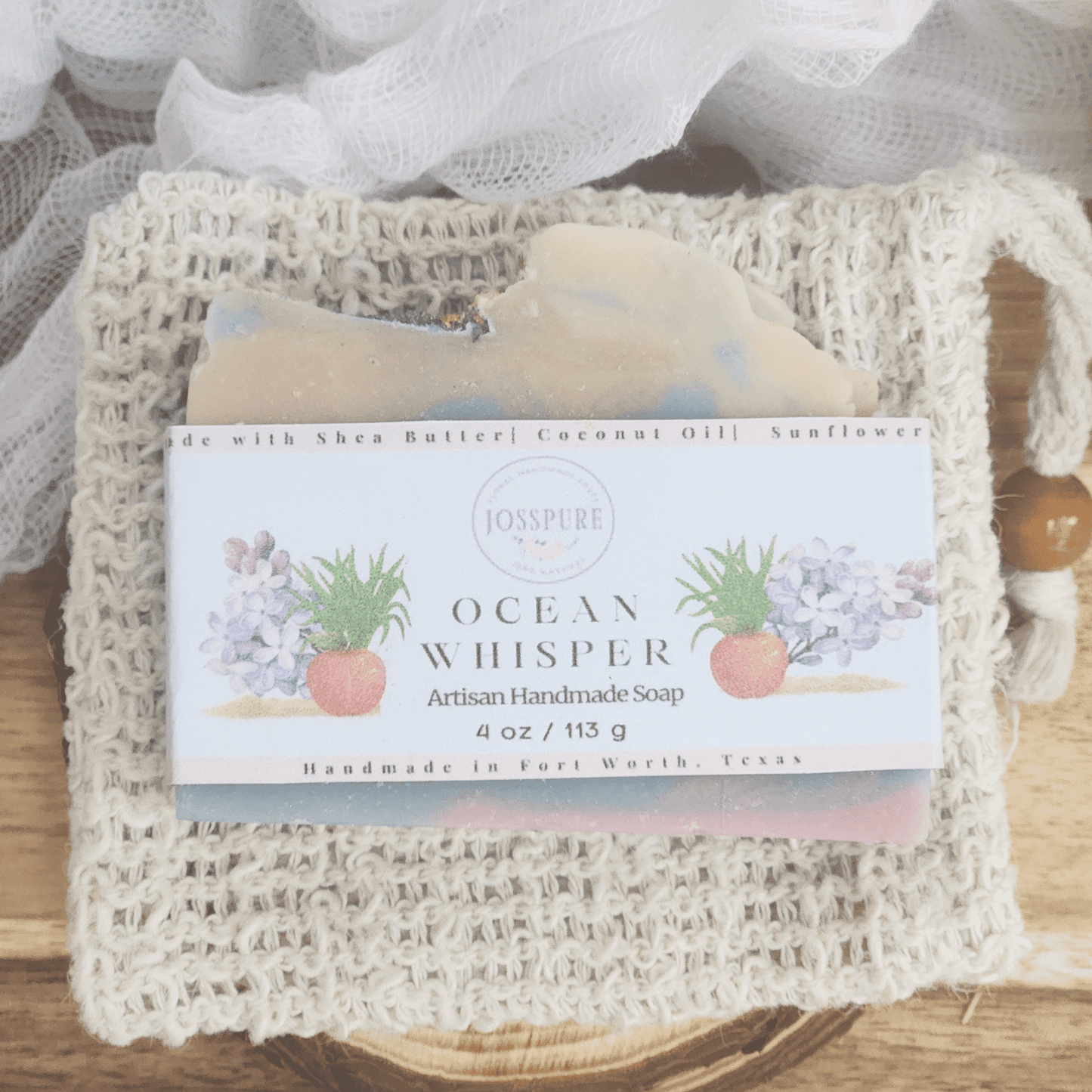 Ocean luxury mild shea butter soap by JOSSPURE artisan handmade natural soap on a woven pouch