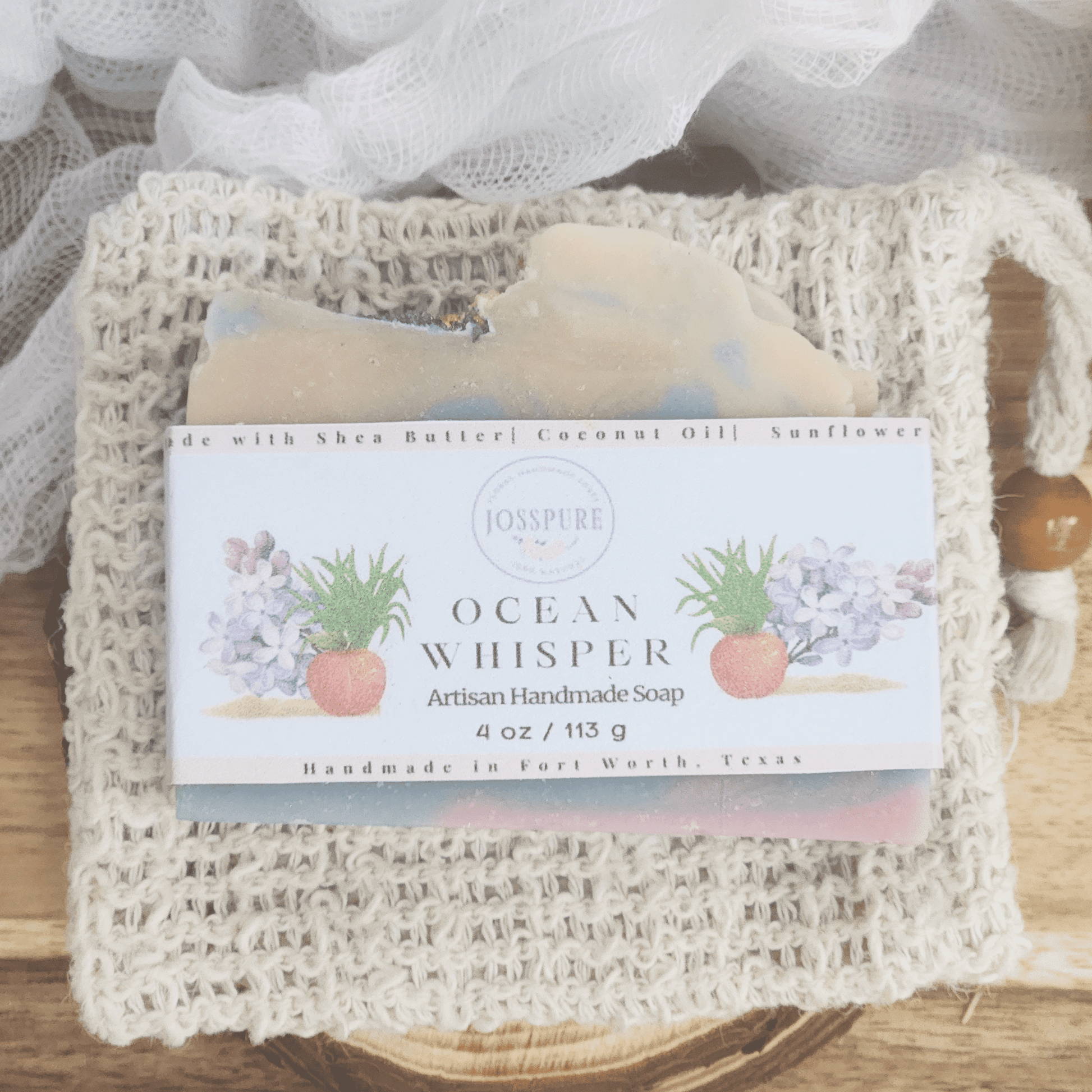 Ocean luxury mild shea butter soap by JOSSPURE artisan handmade natural soap on a woven pouch
