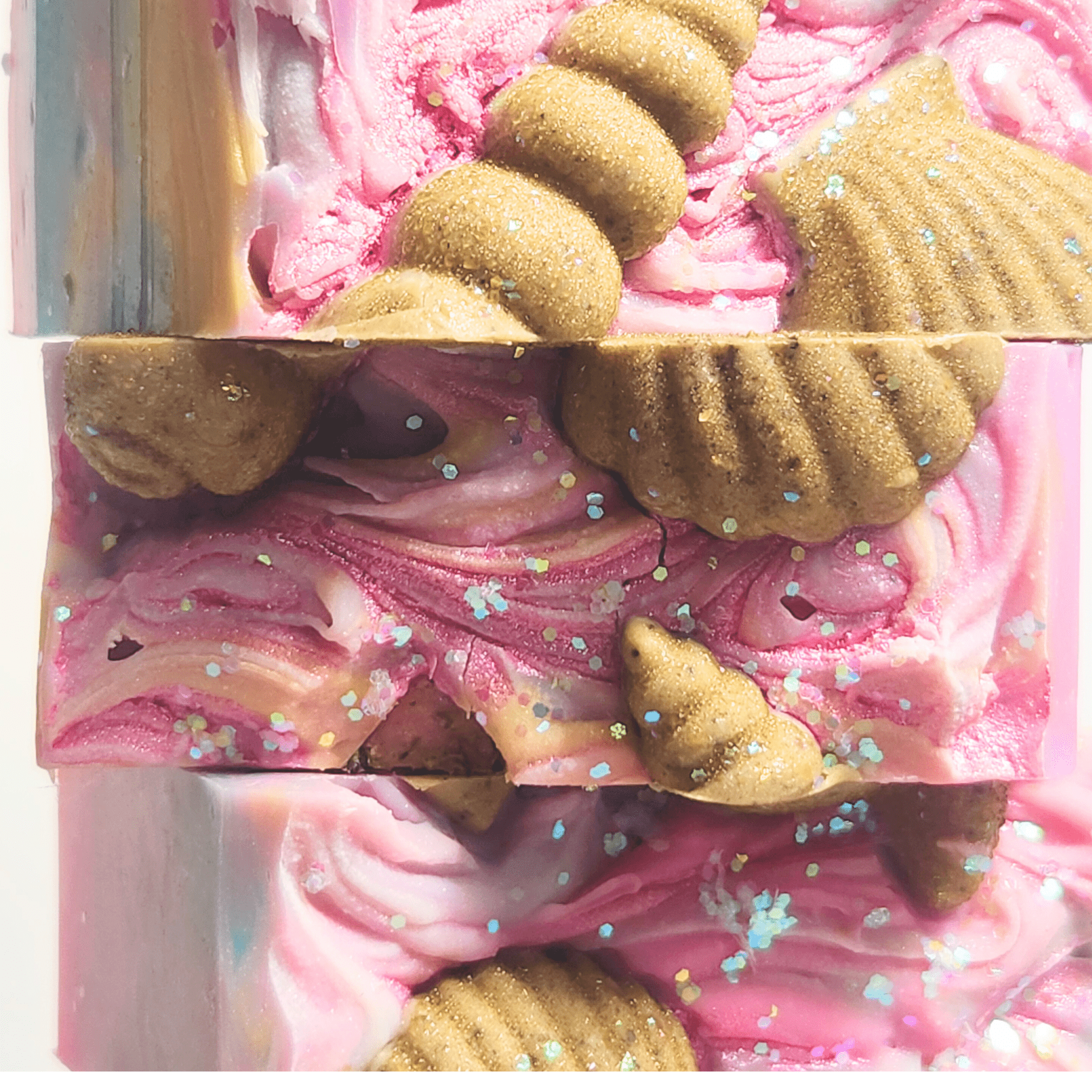 JOSSPURE handmade sea salt shea butter summer soap with pink swirls and seashell designs