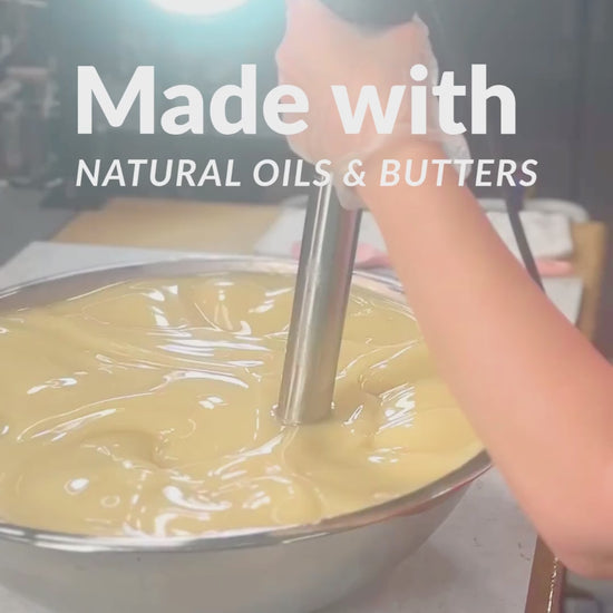 soapmaker using a big stick blender