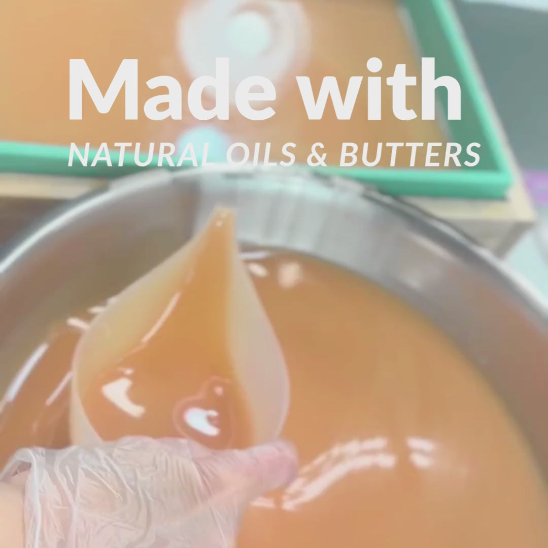 soapmaker pouring soap batter into a mold